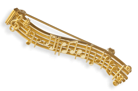 Gold-plated brooch : notes staff