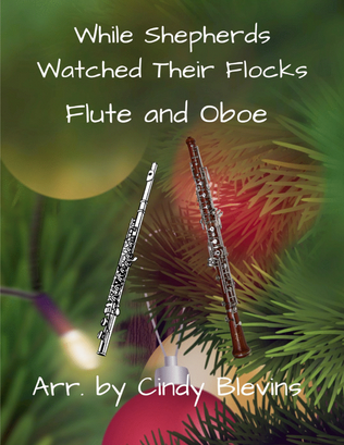 Book cover for While Shepherds Watched Their Flocks, for Flute and Oboe Duet