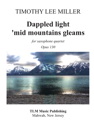 Dappled light 'mid mountains gleams